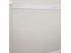 White closet with a wire rack for hanging clothes providing a simple and functional storage solution at 4523 Kingsley Dr, Indianapolis, IN 46205