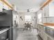 Bright kitchen with stainless steel appliances, farmhouse sink and butcher block countertops at 4523 Kingsley Dr, Indianapolis, IN 46205