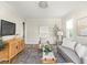 Cozy living room with stylish furnishings, hardwood floors, and ample natural light at 4523 Kingsley Dr, Indianapolis, IN 46205