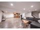 Finished basement includes a brick fireplace, wet bar, and spacious entertaining area at 4976 Rockne Cir, Carmel, IN 46033