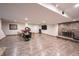 Finished basement offers a cozy fireplace, mounted television, and ample space at 4976 Rockne Cir, Carmel, IN 46033