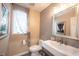 Stylish half bathroom features modern fixtures and elegant decor at 4976 Rockne Cir, Carmel, IN 46033