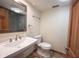 Updated bathroom features a pedestal sink, tile floor, and modern fixtures at 4976 Rockne Cir, Carmel, IN 46033