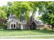 Charming two-story home featuring a well-manicured lawn and mature trees in a desirable neighborhood at 4976 Rockne Cir, Carmel, IN 46033