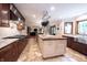 Bright kitchen features a large island, stainless steel appliances, and plenty of cabinet space at 4976 Rockne Cir, Carmel, IN 46033