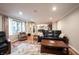 Spacious living room with an open floor plan and abundant natural light at 4976 Rockne Cir, Carmel, IN 46033