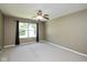 Serene bedroom featuring neutral walls, carpet flooring, and a bright window at 5642 Southern Mist Dr, Indianapolis, IN 46237
