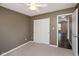 Carpeted bedroom with a ceiling fan and closet for storage at 5642 Southern Mist Dr, Indianapolis, IN 46237