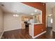 Cozy kitchen with oak cabinets, stainless steel appliances, and eat-in dining area at 5642 Southern Mist Dr, Indianapolis, IN 46237