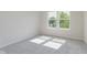 Bright bedroom with natural light and plush carpeting at 5672 High Timber Ln, Indianapolis, IN 46235