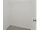 Walk-in closet with neutral carpet and wire shelving providing ample storage and organization at 5672 High Timber Ln, Indianapolis, IN 46235