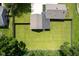 Aerial view showcases the property's fenced backyard and roof at 5902 Oak Ln, Anderson, IN 46013