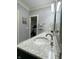 Neutral bathroom featuring gray walls, white trim, granite countertops and a silver faucet at 5993 E County Road 100 S, Avon, IN 46123