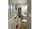 Neutral bathroom featuring a decorative rug, tub/shower combination, and a single sink vanity at 5993 E County Road 100 S, Avon, IN 46123