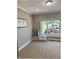 Well-lit bedroom featuring a window bench and a built-in bookcase at 5993 E County Road 100 S, Avon, IN 46123