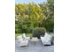 Relaxing outdoor deck features comfortable seating and views of the lush backyard at 5993 E County Road 100 S, Avon, IN 46123