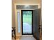 Foyer displaying a beautiful entryway with decorative glass accents, offering a welcoming ambiance at 5993 E County Road 100 S, Avon, IN 46123