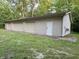Spacious detached garage with multiple bays and a side door, offering plenty of storage at 5993 E County Road 100 S, Avon, IN 46123