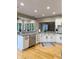 A kitchen featuring white cabinets, granite countertops, stainless steel appliances and hardwood floors at 5993 E County Road 100 S, Avon, IN 46123