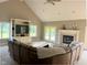 Bright living room with a fireplace, large sectional, and plenty of natural light at 5993 E County Road 100 S, Avon, IN 46123