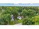 Lush canopy view of the neighborhood with mature trees and charming homes, conveying a sense of community at 6009 Ralston Ave, Indianapolis, IN 46220