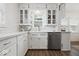 A bright kitchen with white cabinets, subway tile backsplash, and stainless steel appliances at 6009 Ralston Ave, Indianapolis, IN 46220