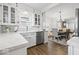 A combined kitchen and dining area featuring white cabinets, and stainless steel appliances at 6009 Ralston Ave, Indianapolis, IN 46220