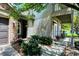 Exterior view of the front entrance, featuring a beautifully landscaped walkway and a cozy porch at 6298 Briargate Dr, Zionsville, IN 46077