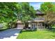Charming two-story home featuring a double-deck porch and a well-manicured lawn at 6298 Briargate Dr, Zionsville, IN 46077