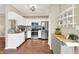 Well-equipped kitchen with stainless steel appliances, granite countertops, and ample cabinet space at 6298 Briargate Dr, Zionsville, IN 46077