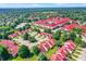 Scenic aerial view of a residential neighborhood with well-manicured lawns, mature trees, and tidy streets at 6402 Friendship Cir, Indianapolis, IN 46268