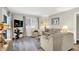 Inviting living room featuring comfortable seating and a large window at 6402 Friendship Cir, Indianapolis, IN 46268