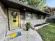 Front entrance featuring a decorative wreath and Hello Sunshine welcome mat at 6430 N Rural St, Indianapolis, IN 46220