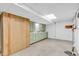 Finished basement features linoleum flooring and wall storage at 696 W Mill St, Danville, IN 46122