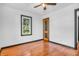 Light-filled bedroom with hardwood floors, white walls, and a view of the outdoors at 696 W Mill St, Danville, IN 46122