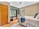 Bright bedroom with natural light and built-in desk and shelving at 696 W Mill St, Danville, IN 46122