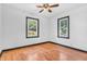 Charming bedroom featuring hardwood floors, natural light, and neutral-toned walls at 696 W Mill St, Danville, IN 46122