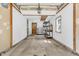Attached garage with side door entry offers parking and storage at 696 W Mill St, Danville, IN 46122