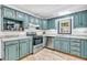 Well-maintained kitchen with stainless steel appliances and ample cabinet space at 696 W Mill St, Danville, IN 46122