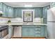 Updated kitchen featuring stainless steel appliances, functional layout, and plenty of storage space at 696 W Mill St, Danville, IN 46122