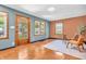 Bright living room with hardwood floors, a view of the outdoors, and comfortable seating at 696 W Mill St, Danville, IN 46122