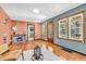 Spacious living room with a fireplace and seamless transition to the kitchen at 696 W Mill St, Danville, IN 46122