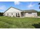 Spacious backyard featuring a well-manicured lawn and an inviting outdoor space at 712 Disciples Way, Greenwood, IN 46143
