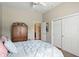 Comfortable bedroom features a ceiling fan and large closet for ample storage at 712 Disciples Way, Greenwood, IN 46143