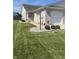 Beautiful brick home with a well-maintained lawn and attached garage at 712 Disciples Way, Greenwood, IN 46143