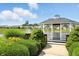 Beautiful community gazebo overlooking a pond with a fountain and landscaped gardens at 712 Disciples Way, Greenwood, IN 46143