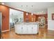 Kitchen island offers generous counter space, enhancing the home's openness and appeal at 712 Disciples Way, Greenwood, IN 46143