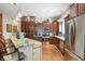 Open-concept kitchen featuring stainless steel appliances and a large island with seating at 712 Disciples Way, Greenwood, IN 46143