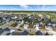 An aerial view of a neighborhood with multiple homes and greenery at 7301 Deerberg Dr, Indianapolis, IN 46259
