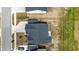 Drone shot of a home's roof with surrounding neighborhood and street at 7301 Deerberg Dr, Indianapolis, IN 46259